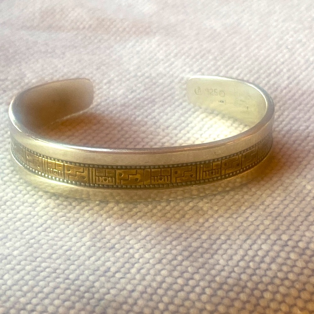 Sterling silver and 14 karat gold cuff bracelet 🌺
